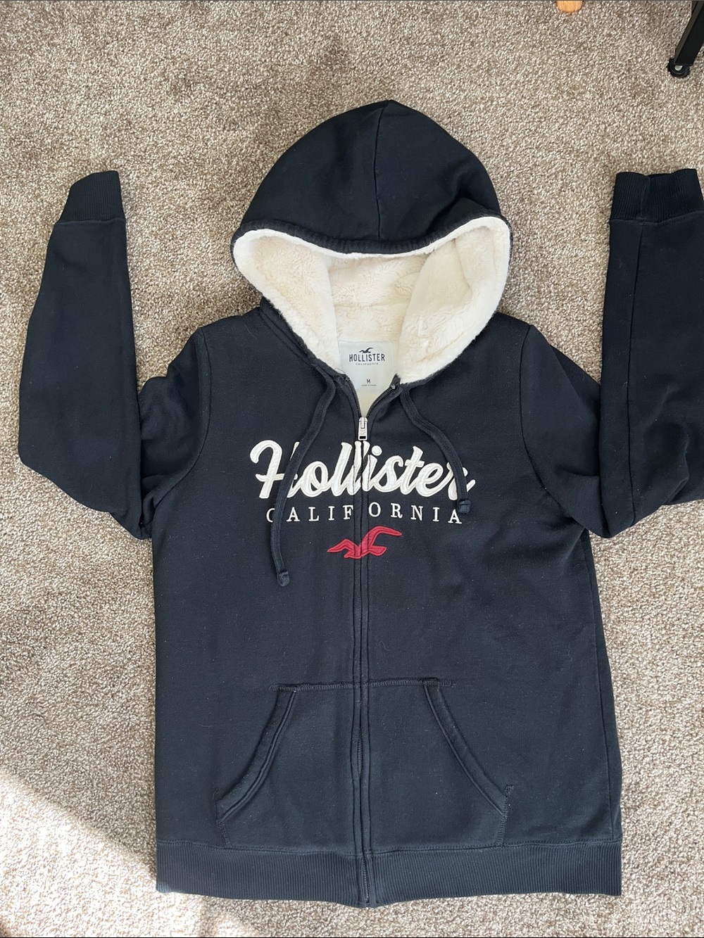 Hollister Black Zip Hoodie with Cream Sherpa Hood and Red Logo